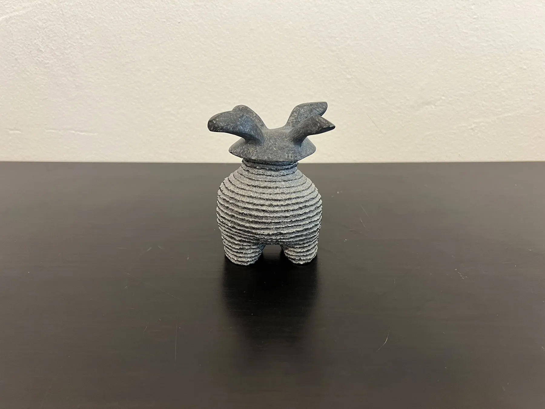 Criança Malcriada, Shintaro Nakaoka, 2024, Granite sculpture